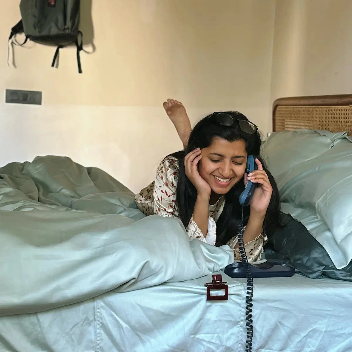 Saanjh Mint bedsheet set, women chatting blusing on phone, clip attached to pocket